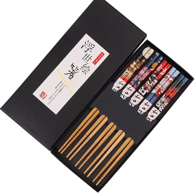 Set of five pairs of bamboo chopsticks with Japanese Lucky Cat and blue wave patterns in a gift box.