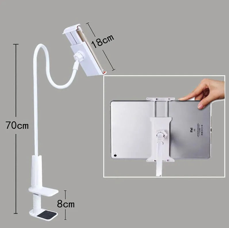 Bedside long-arm mobile phone holder in aluminium alloy and plastic on a table.