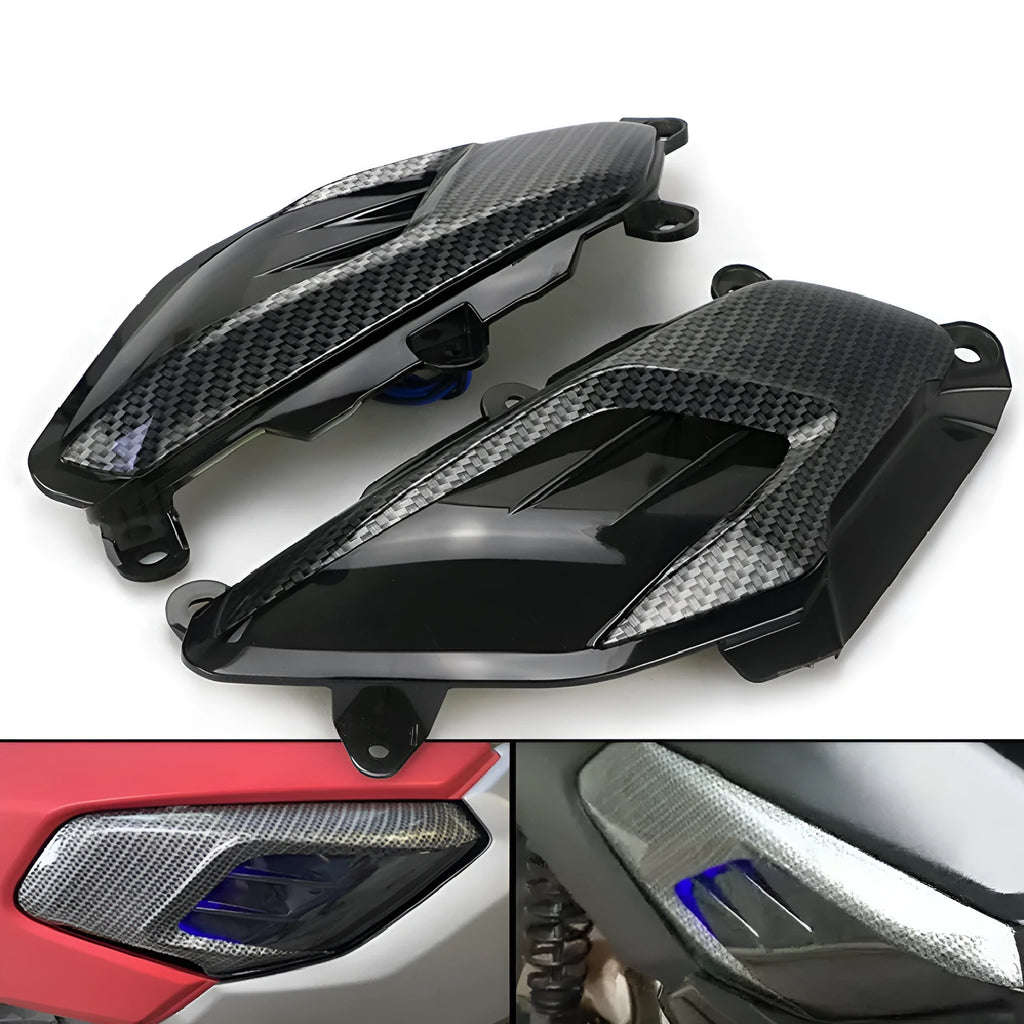 Pair of YAMAHA NMAX carbon fibre style LED side lamps in blue or red.