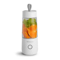 White portable USB rechargeable blender bottle with silicone carry ring, 350ml Tritan cup, and stainless steel blades.