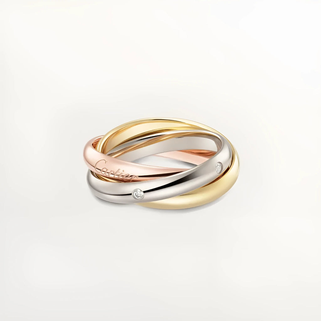 A set of two silver U-shaped geometric couple's rings, one with full diamonds and one plain, on a jewellery display.