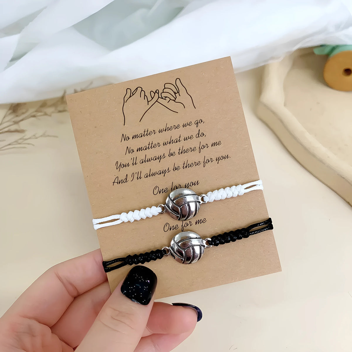 Black and white mixed color geometric bracelet with electroplated alloy finish on white background