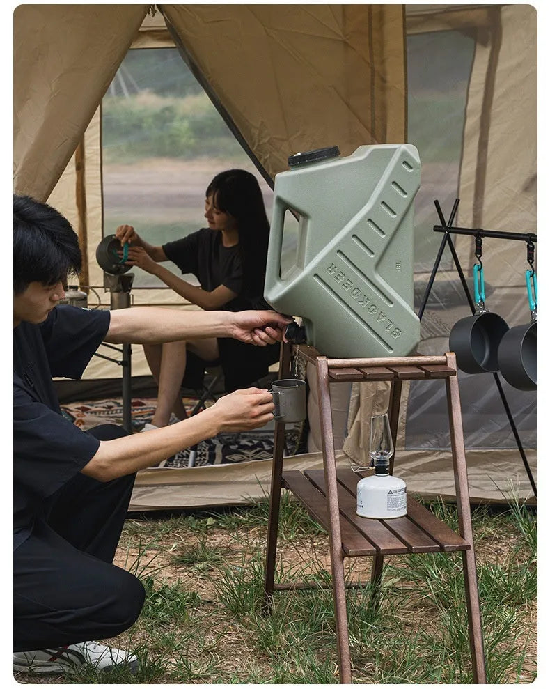 Green collapsible camping water storage tank shown in 13-litre snail and 18-litre backpack styles