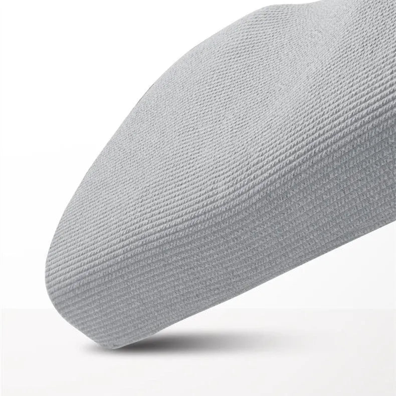 Grey memory foam neck support pillow with knitted cotton cover and adjustable loft for pain relief