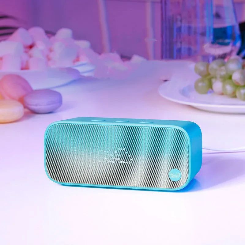 Elf sugar cube WiFi smart AI speaker in blue, green, red, or white colours with bookshelf design