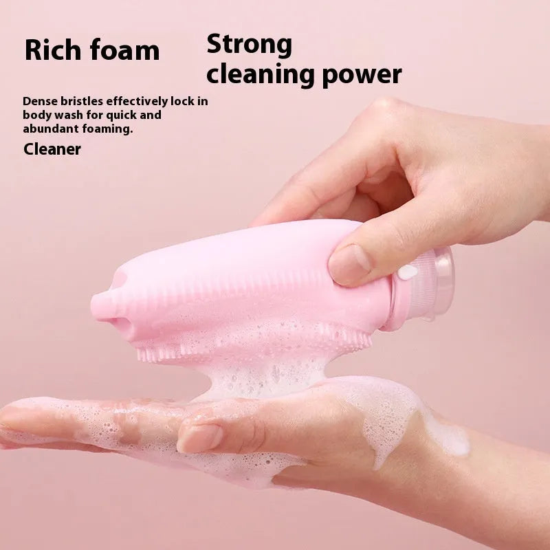 Creative silicone bath brush storage bottle in light grey colour on a bathroom shelf.