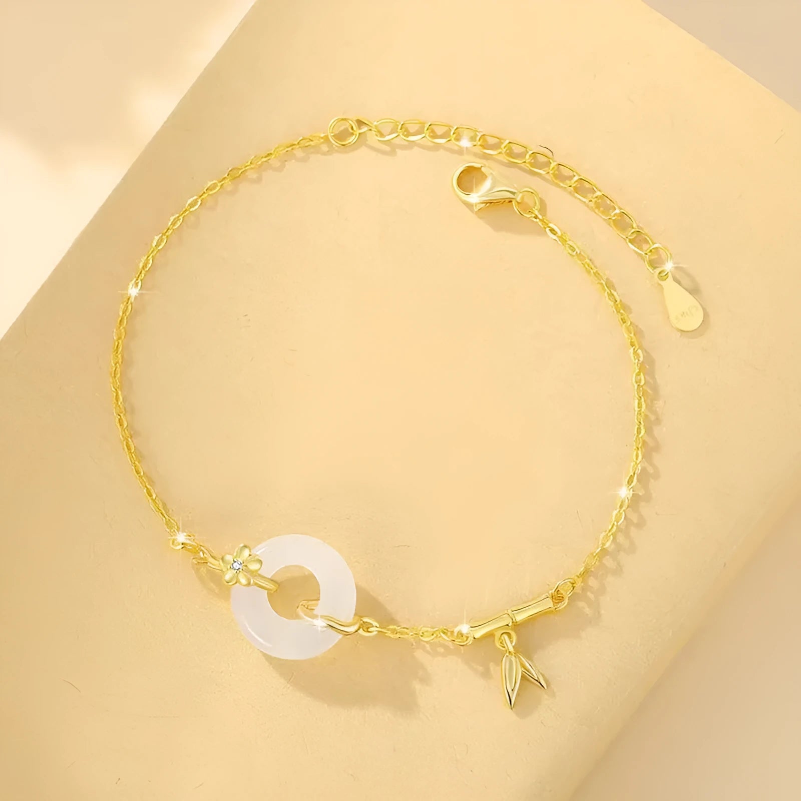 Women's silver bracelet with white chalcedony and starry sky design featuring peace buckle