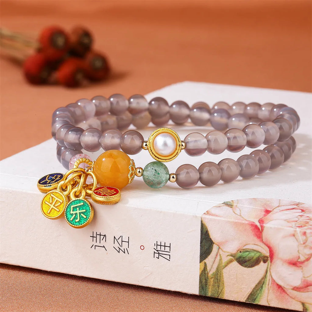 Natural grey agate women's bracelet with two-circle design showing safe and happy symbolism