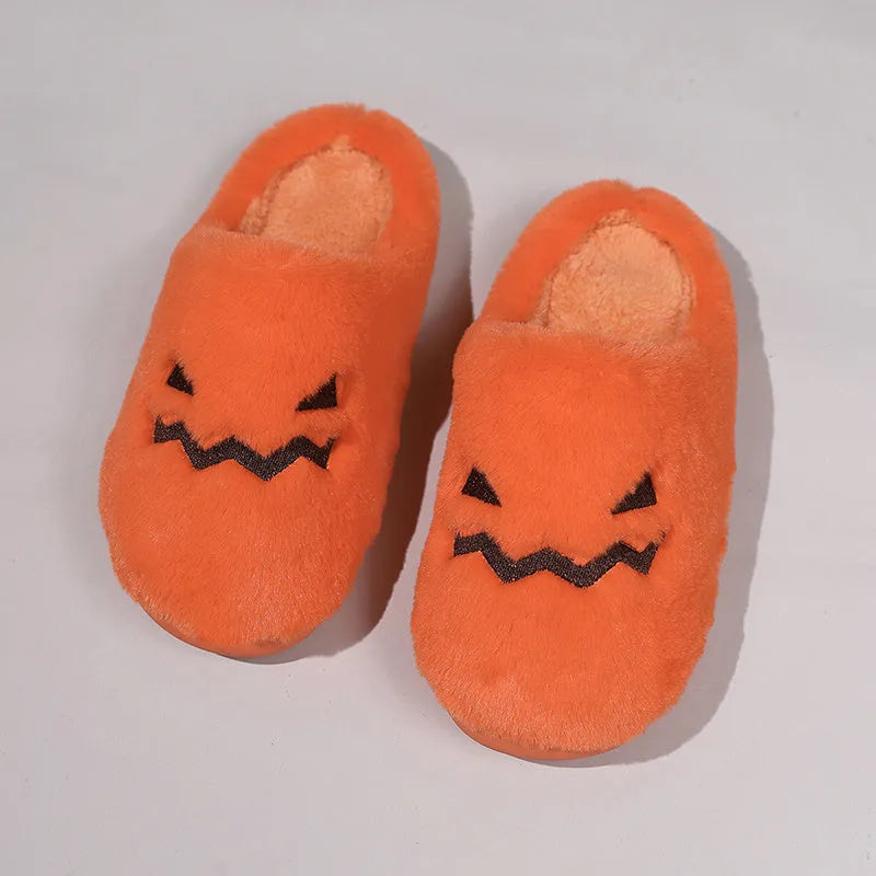 Orange plush Halloween pumpkin slippers with a coral velvet upper and non-slip sole