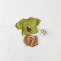 Girls' olive green cotton shorts suit set with ice cream patch detail on short sleeve shirt.