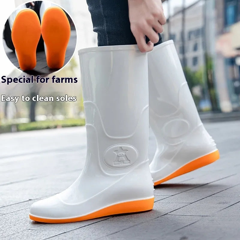 Plastic high tube rain boots in white colour with flat heel and round toe design