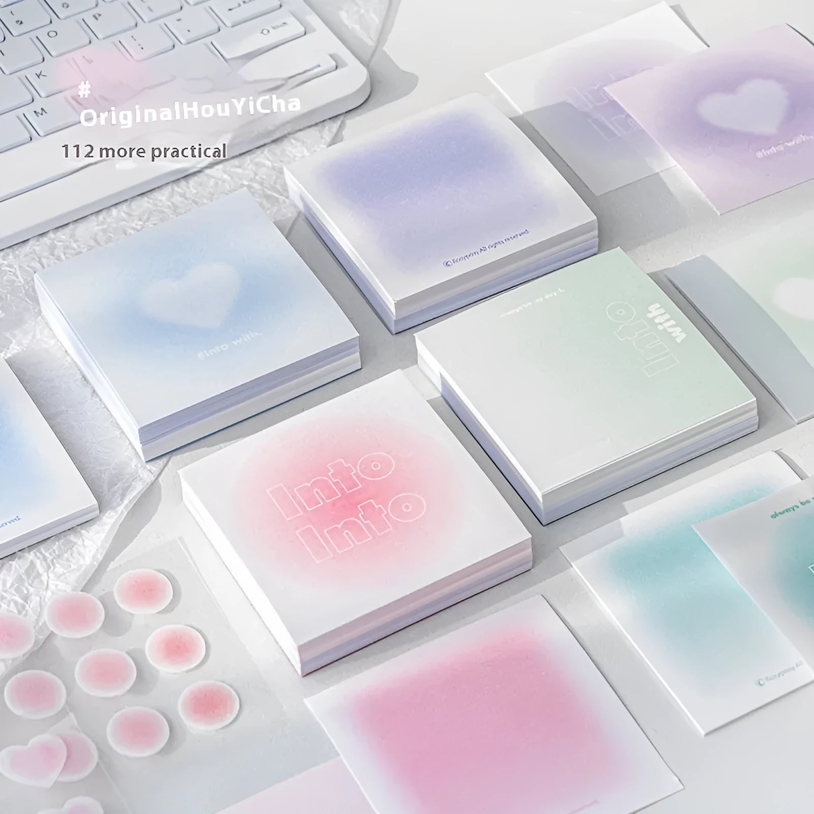 Square multifunctional notepad with gradient parchment paper, sticky notes, and plain pages in blush, green, blue, and purple colour options