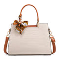 Milky white women's square shoulder handbag made from PU leather, showing slit pocket and clean sewing lines.