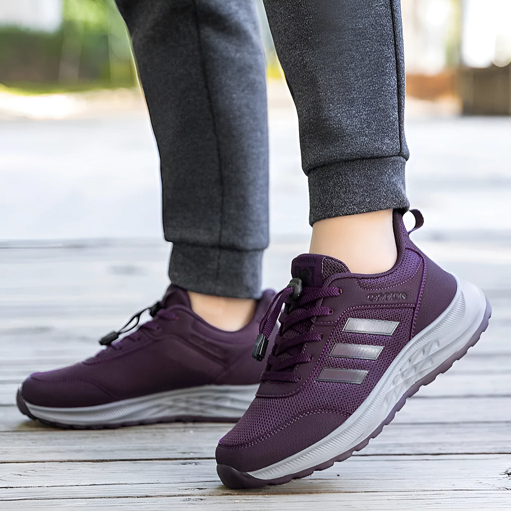 Breathable mesh elastic slip-on shoes for men and women in various colours on a non-slip sole.