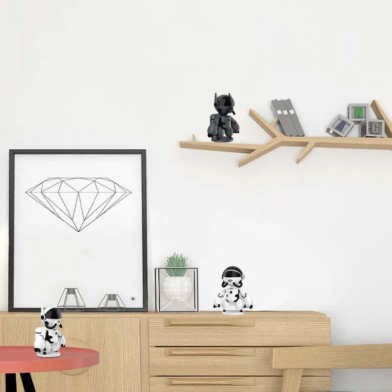 White or black wireless household security camera on a detachable base with a wide-angle lens.