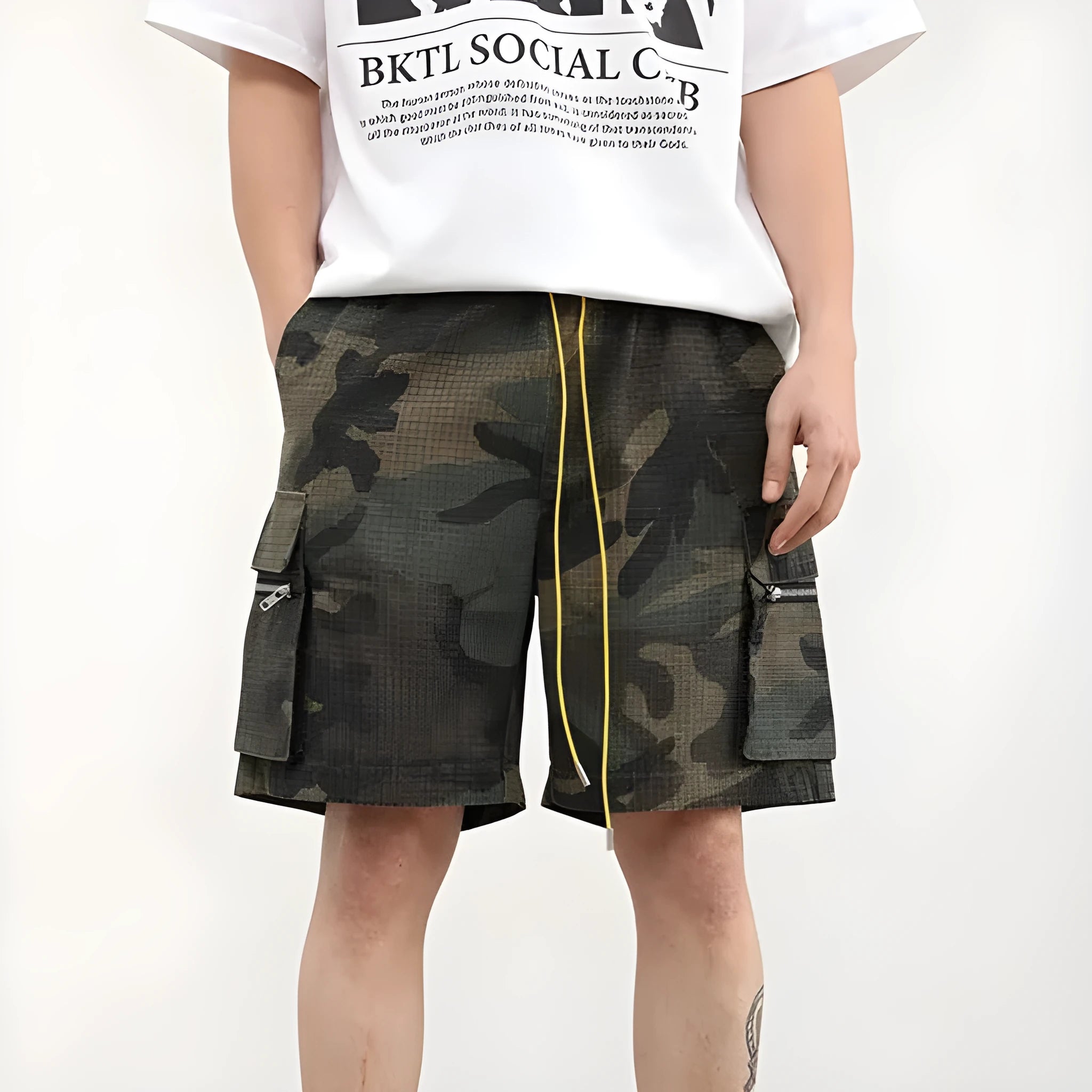 Men's camouflage cotton blend cargo shorts with multiple pockets, shown in a loose cropped fit.