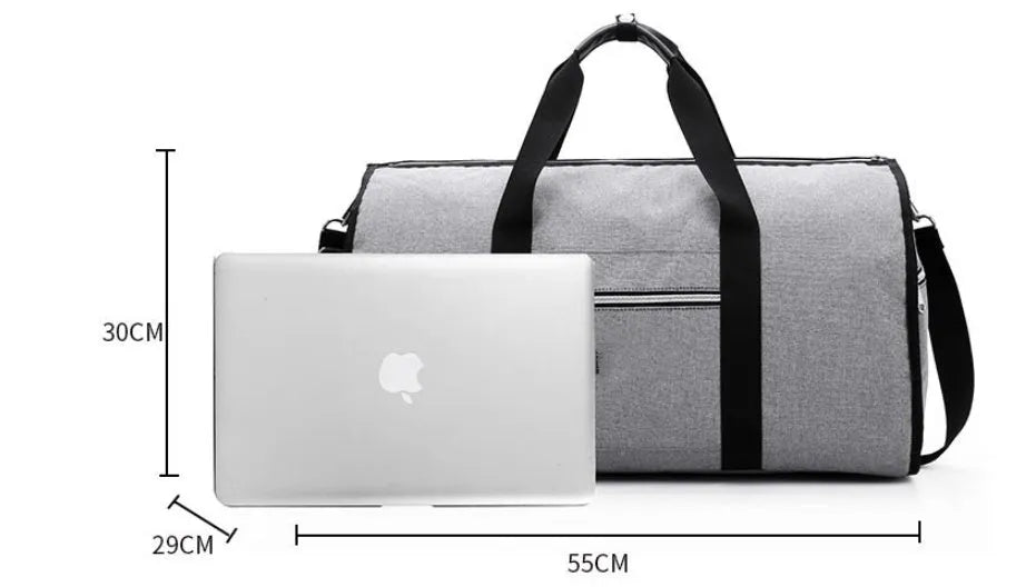 Medium cylinder travel bag in black showing zipper opening and cylindrical shape.