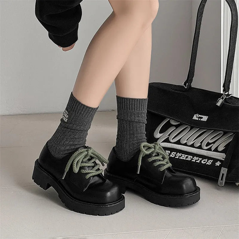 Big Head Derby men's and women's platform leather casual shoes with rubber sole on a neutral background.
