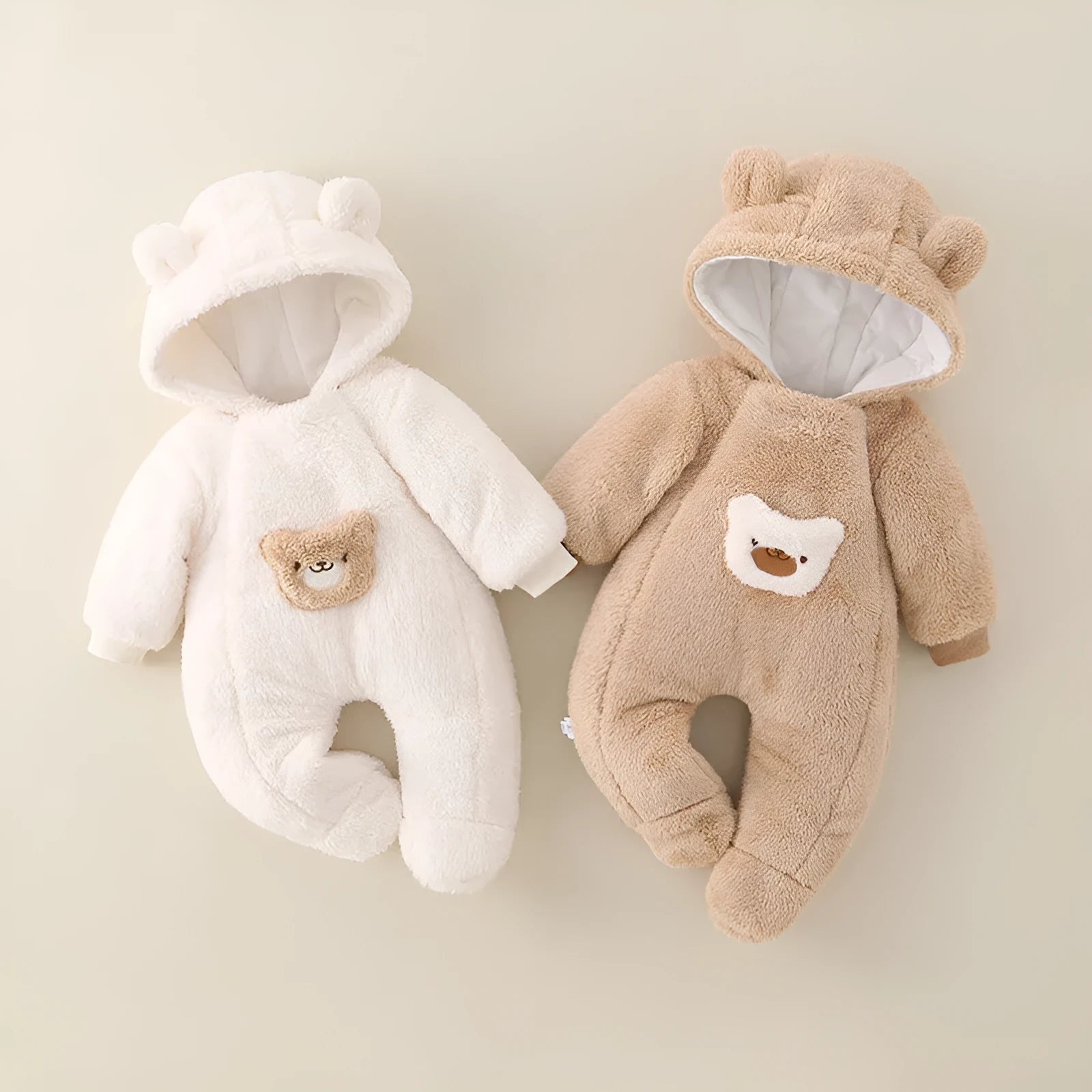 Unisex baby jumpsuit in milky white thickened polyester with front zipper closure