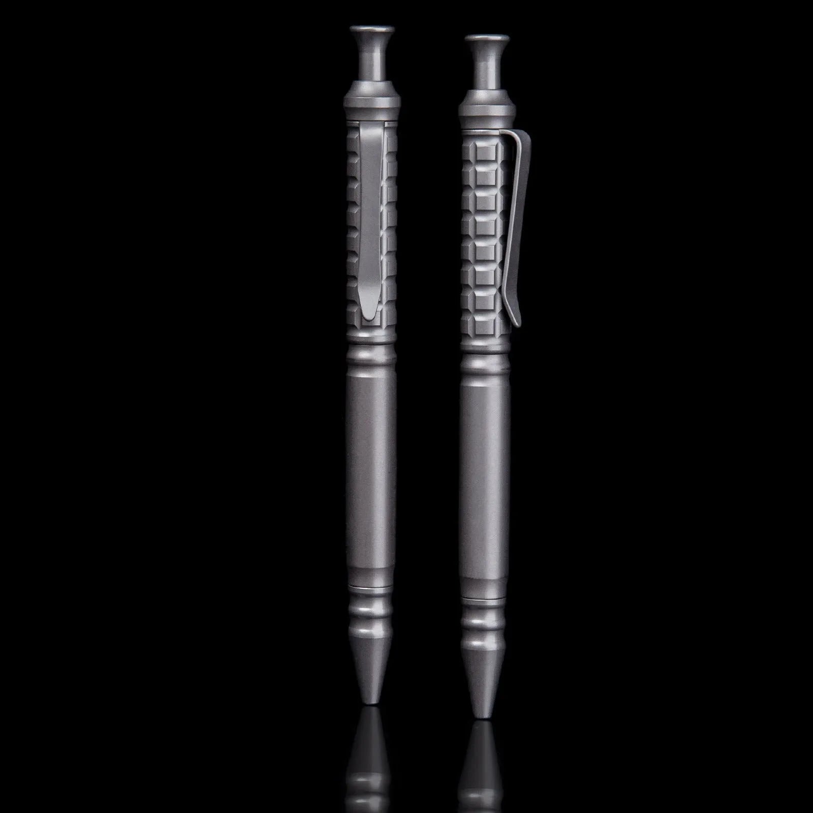 Gunmetal grey titanium tactical pen with push-action mechanism and 0.5mm nib