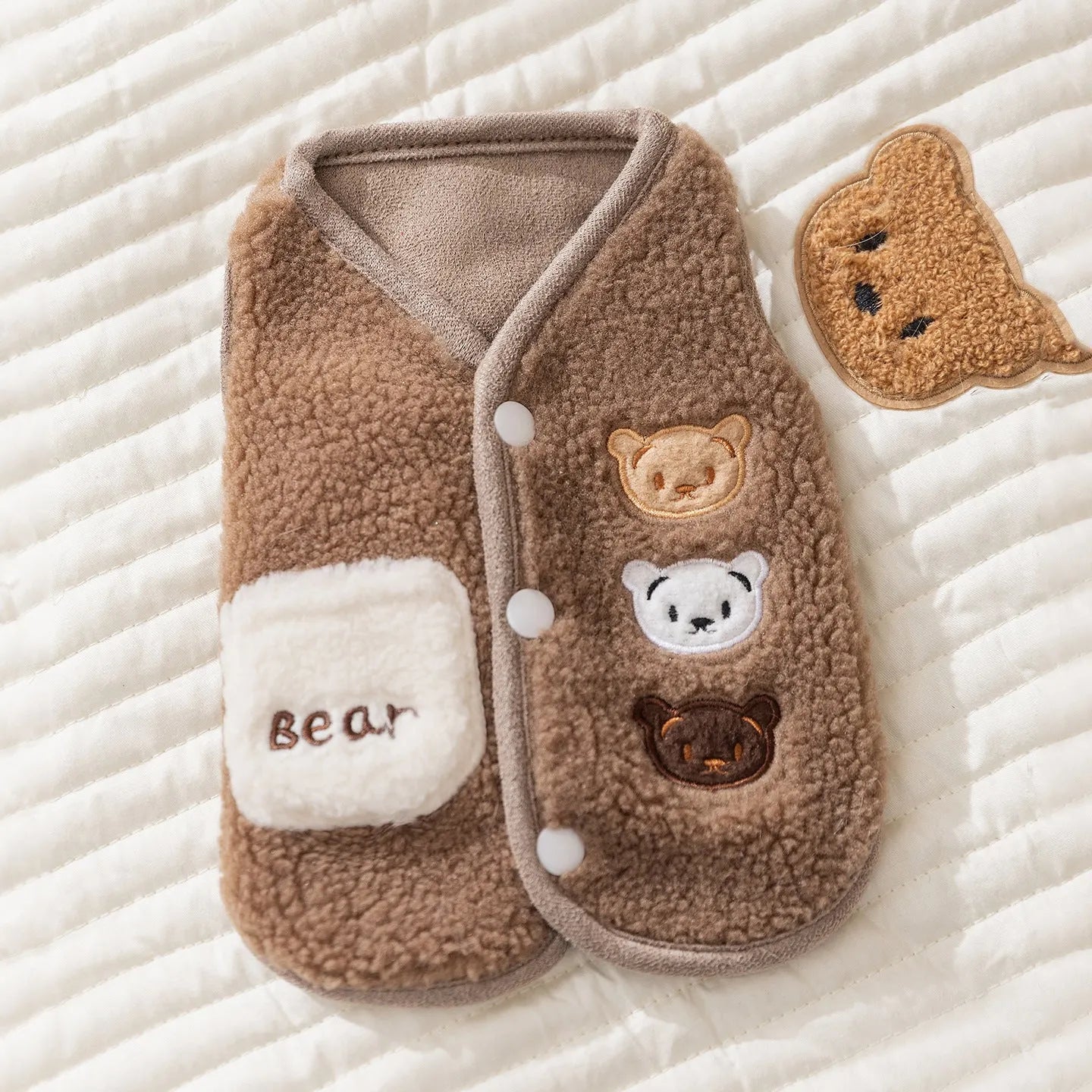 Brown fleece dog jacket with beige white and brown bear embroidery on side, side-button closure, small embroidered pocket, for small breeds