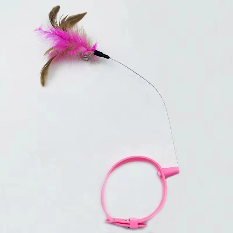 Silicone cat feather collar toy with adjustable teasing wand and bell attachment in blue and pink colours