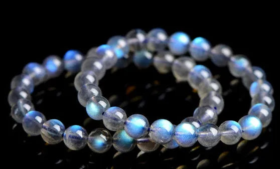 Natural cream body blue moonlight crystal bracelet showing grinding treatment details