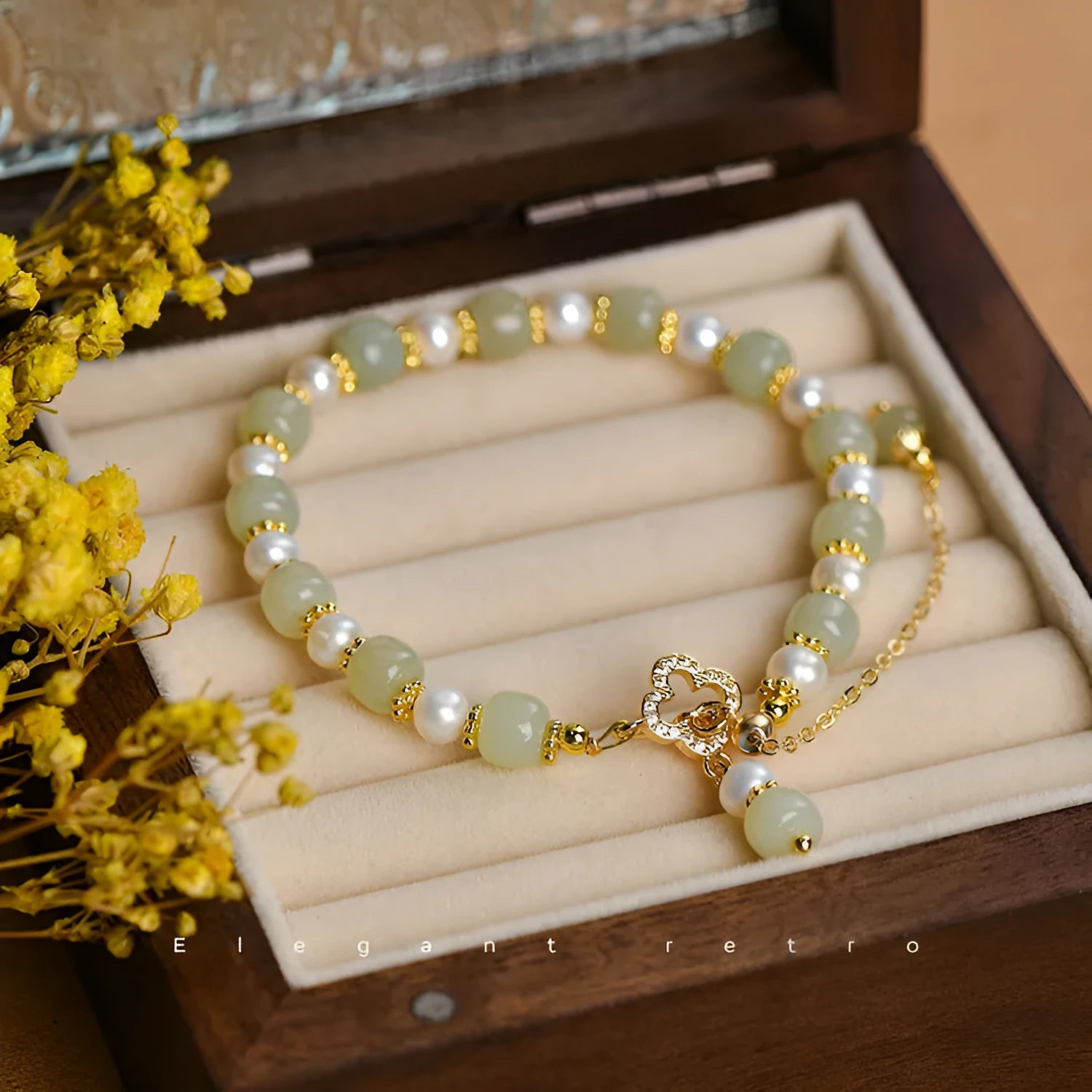 Women's bracelet with round Hetian jade pendant on gold-tone electroplated chain, Chinese-style design