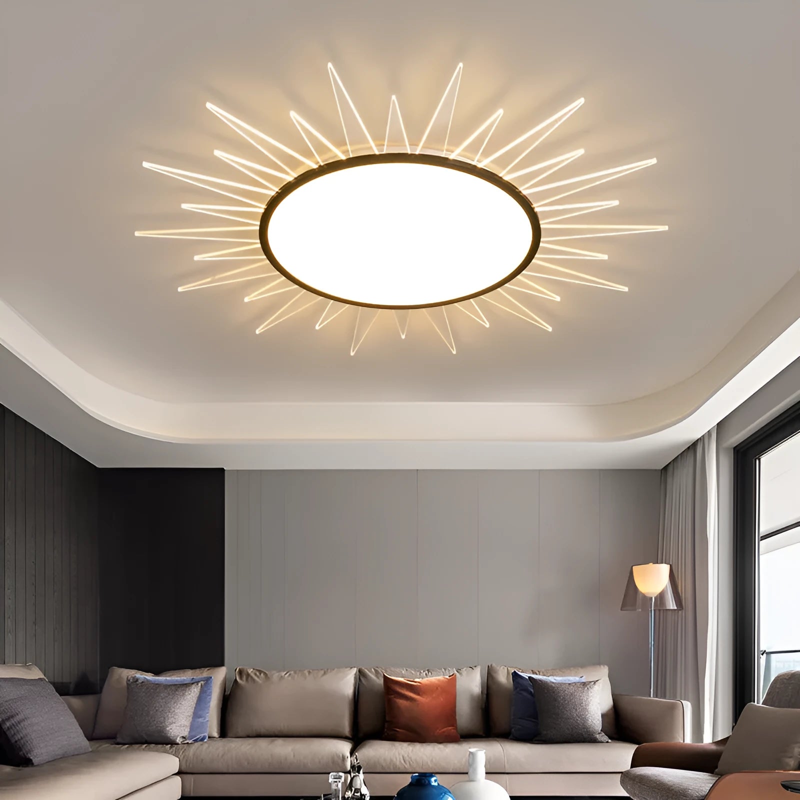 Round aluminium LED ceiling lamp with remote control for dimmable white and tricolour lighting.