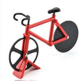 Bicycle-shaped pizza cutter with stainless steel blade and hand-grip handle on a cutting board