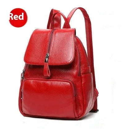 Solid colour genuine leather women's backpack showing blue and wine red options with internal compartments.