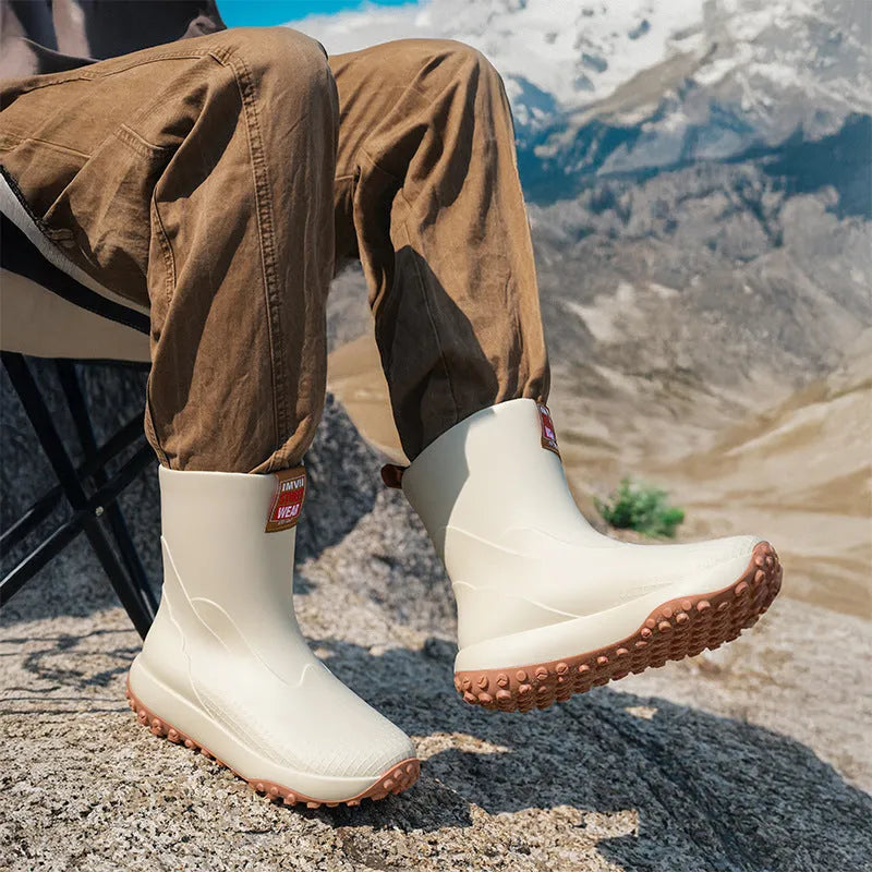 Men's PVC rain boots in black red colour with non-slip plastic soles and round toe design