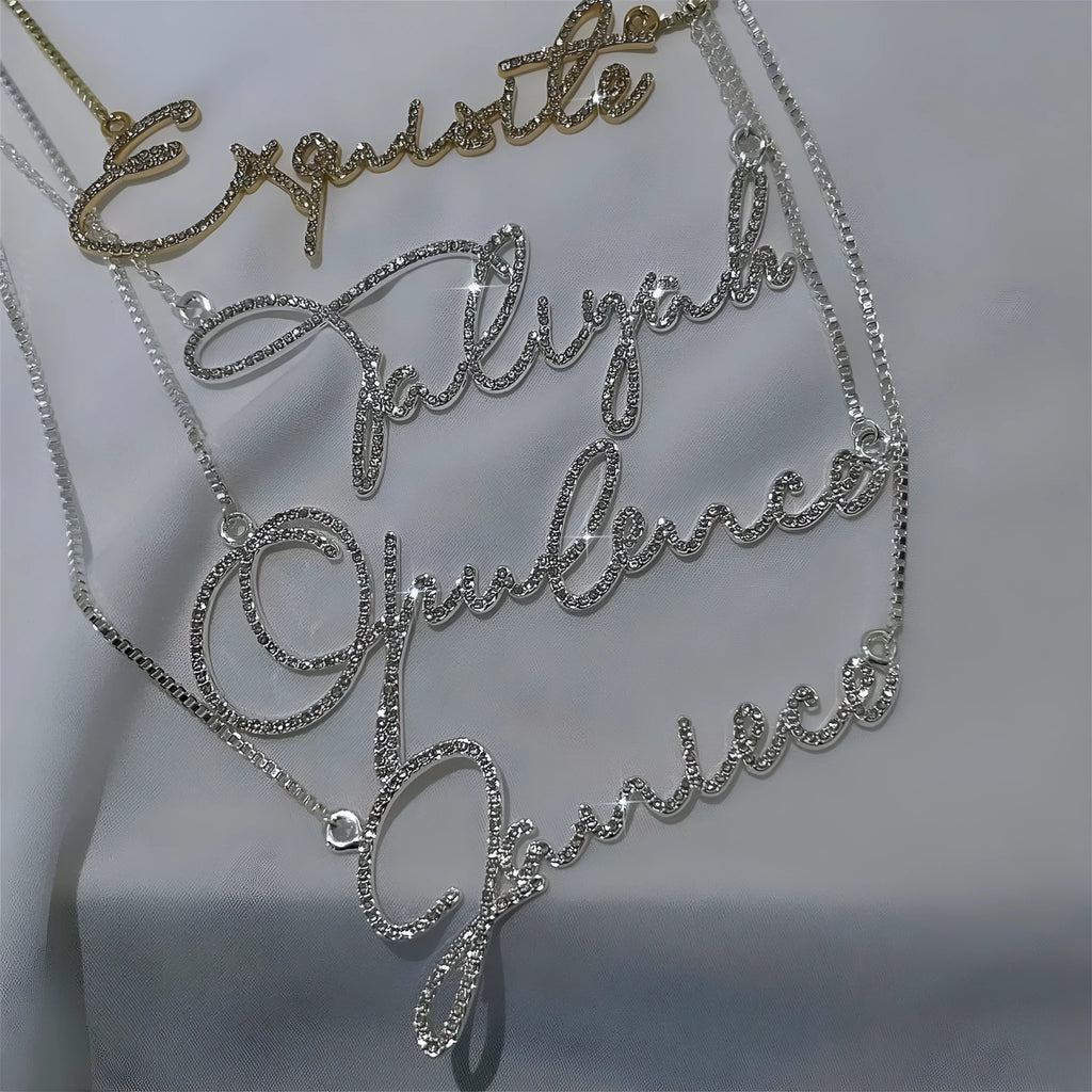 Stainless steel name necklace with diamond-coated English letters on a chain in silver, gold, or rose gold.