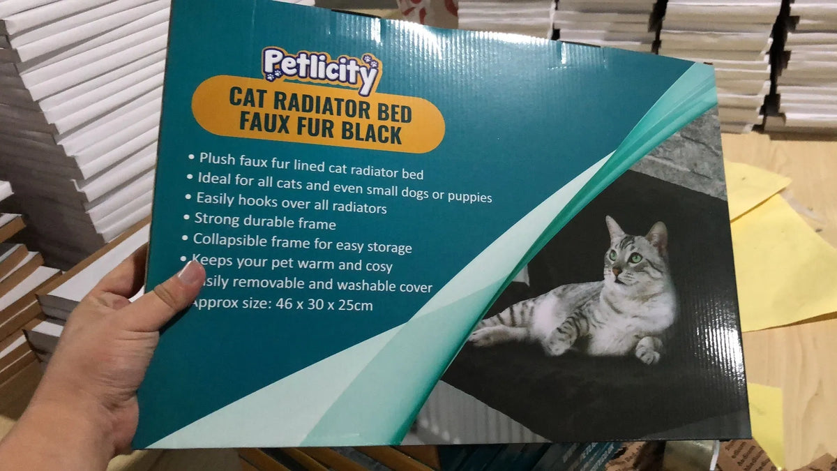 Grey cat bed hammock made of plush material measuring 46 by 30 by 25 cm