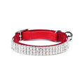 A soft velvet cat collar with a central rhinestone, shown in one of five available colours.