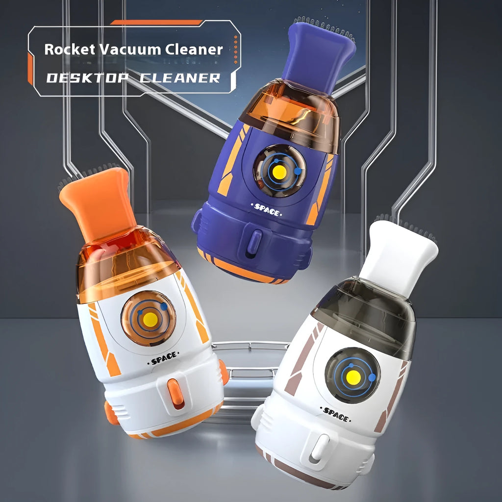 Handheld cordless desktop vacuum cleaner in blue rocket design with USB charging cable.
