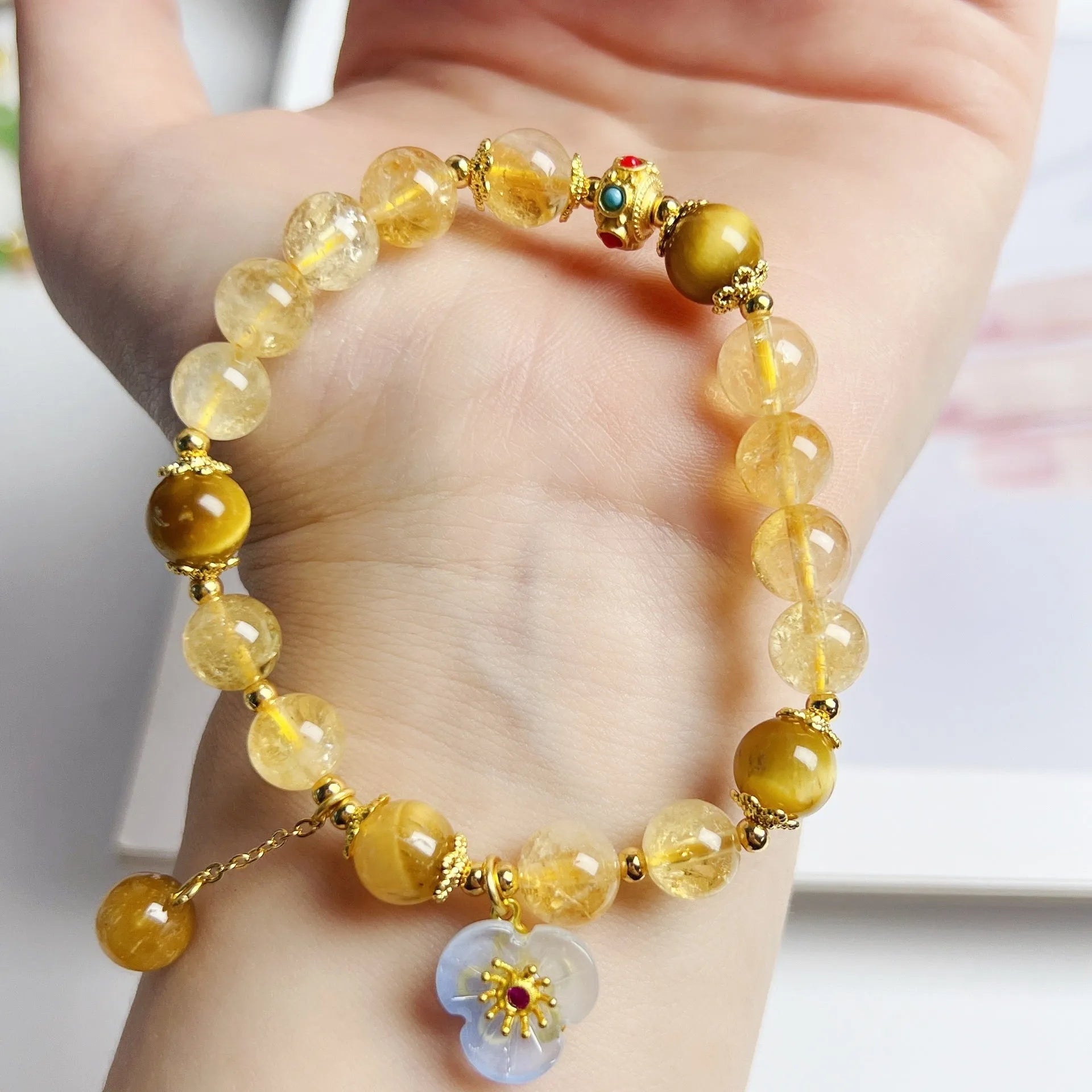 Yellow citrine crystal bracelet with flower tassel decoration for women