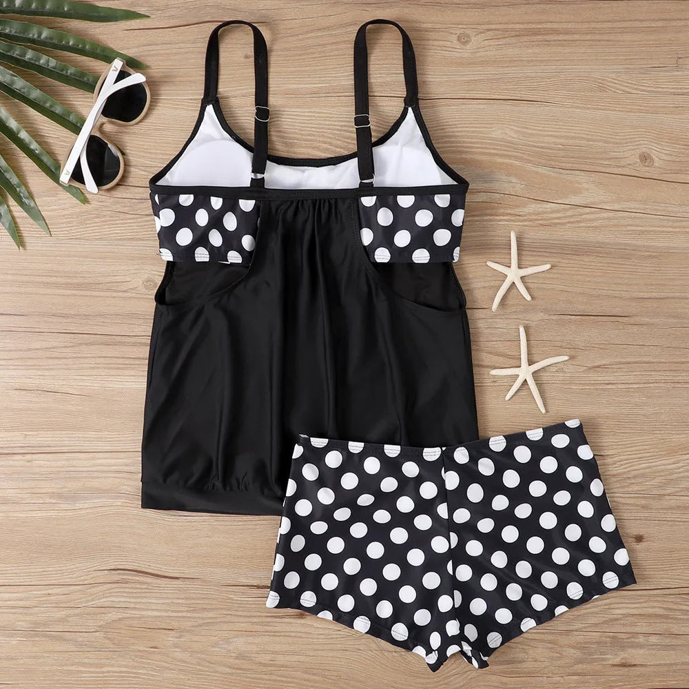 Women's black polka dot two-piece swimsuit with high-waisted boxer briefs.