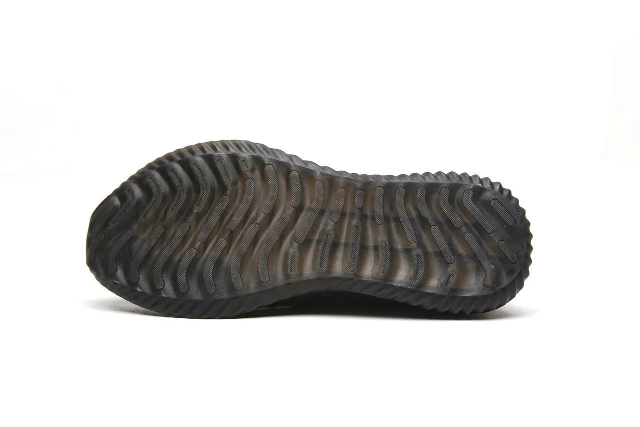 Low-cut black safety shoe with a steel toe cap on a grey background.