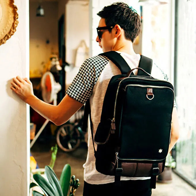 Modern Oxford cloth men's backpack in Army Green colour, showing its large capacity and structured design