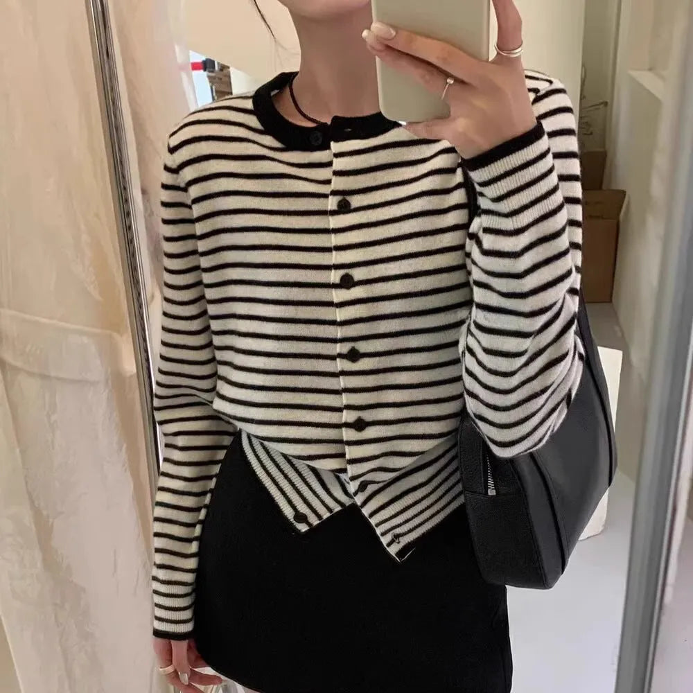 French style striped cardigan sweater coat with slim fit and short length on dark grey background
