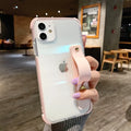 Transparent two-colour silicone phone case with a flip-out stand in black, green, pink, purple, or white.