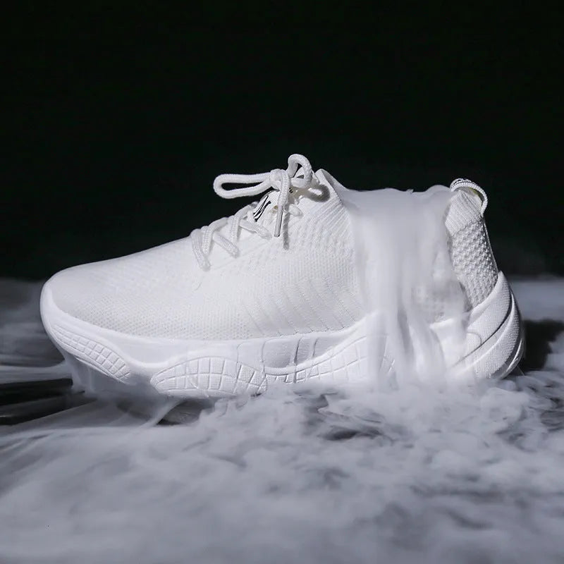 Women's white low-top sports shoes with a woven upper and thick rubber sole.
