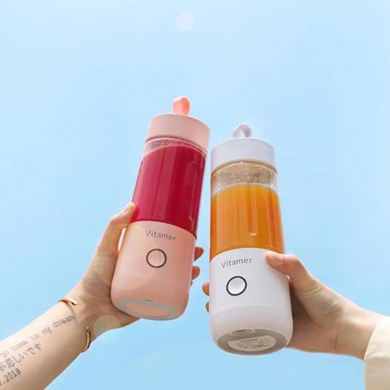 White portable USB rechargeable blender bottle with silicone carry ring, 350ml Tritan cup, and stainless steel blades.
