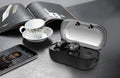 Ultra-lightweight black Bluetooth 5.0 TWS sports earbuds with a compact white charging case on a grey background.