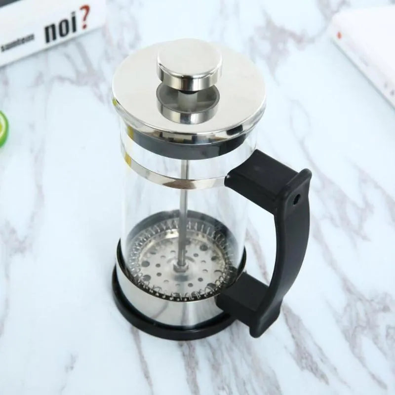 350ml capacity coffee maker with glass carafe and stainless steel components measuring 10cm wide by 8cm deep by 17cm high