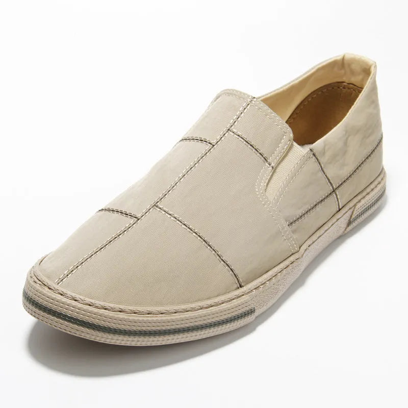 Men's slip-on canvas shoes in six colours with vulcanised rubber soles and low-top design