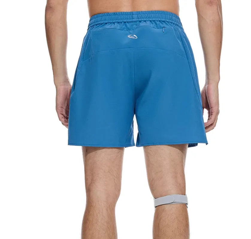 Black and blue four-point stretch running shorts with laser-punched seams on a mannequin.
