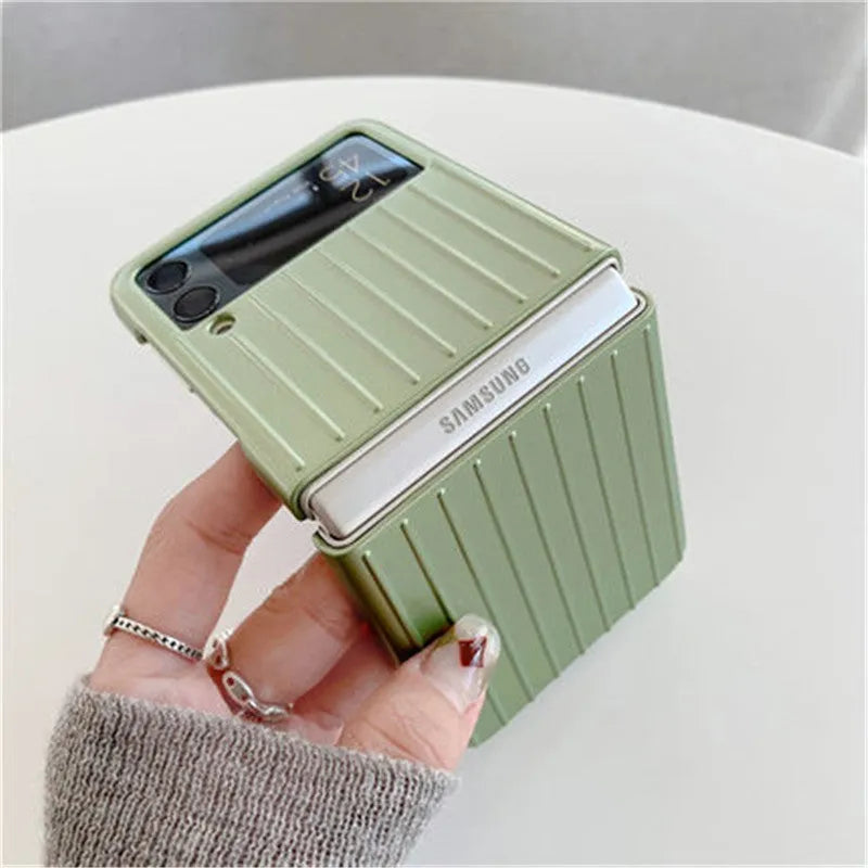 Ultra-thin flip phone case for Samsung Z Flip3 in seven solid colours on a table.