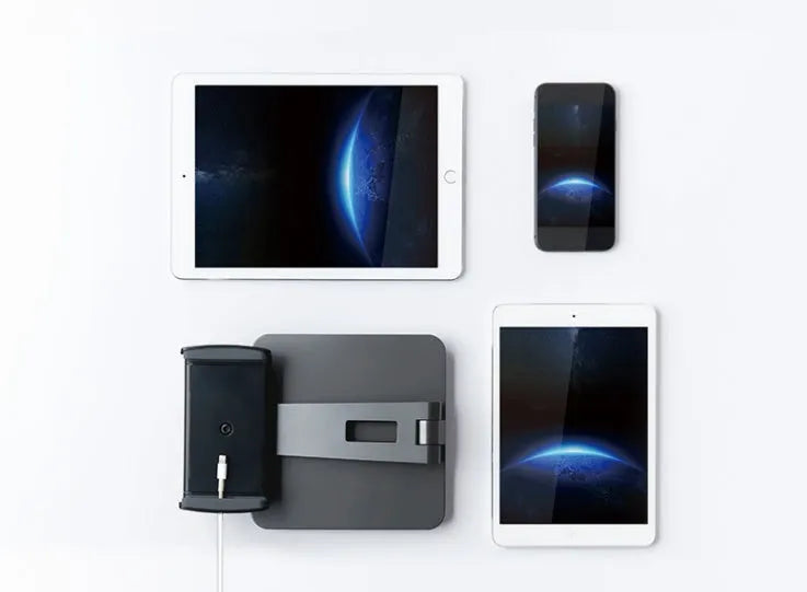 Silver foldable tablet stand showing 360-degree rotation mechanism with silicone anti-slip pads